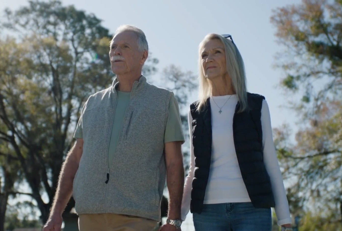 Man and woman taking a walk and holding hands