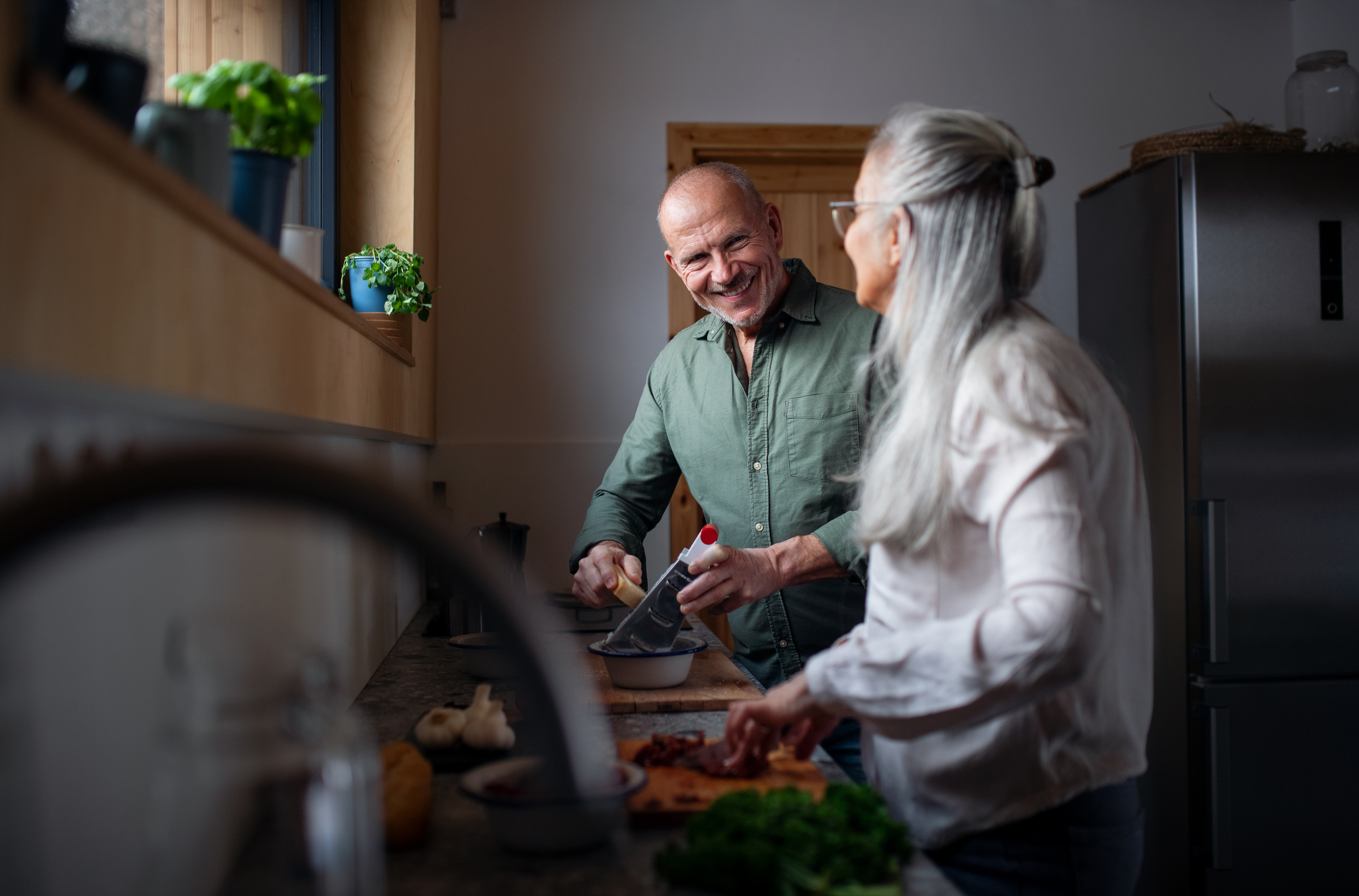 Man and woman cooking. 