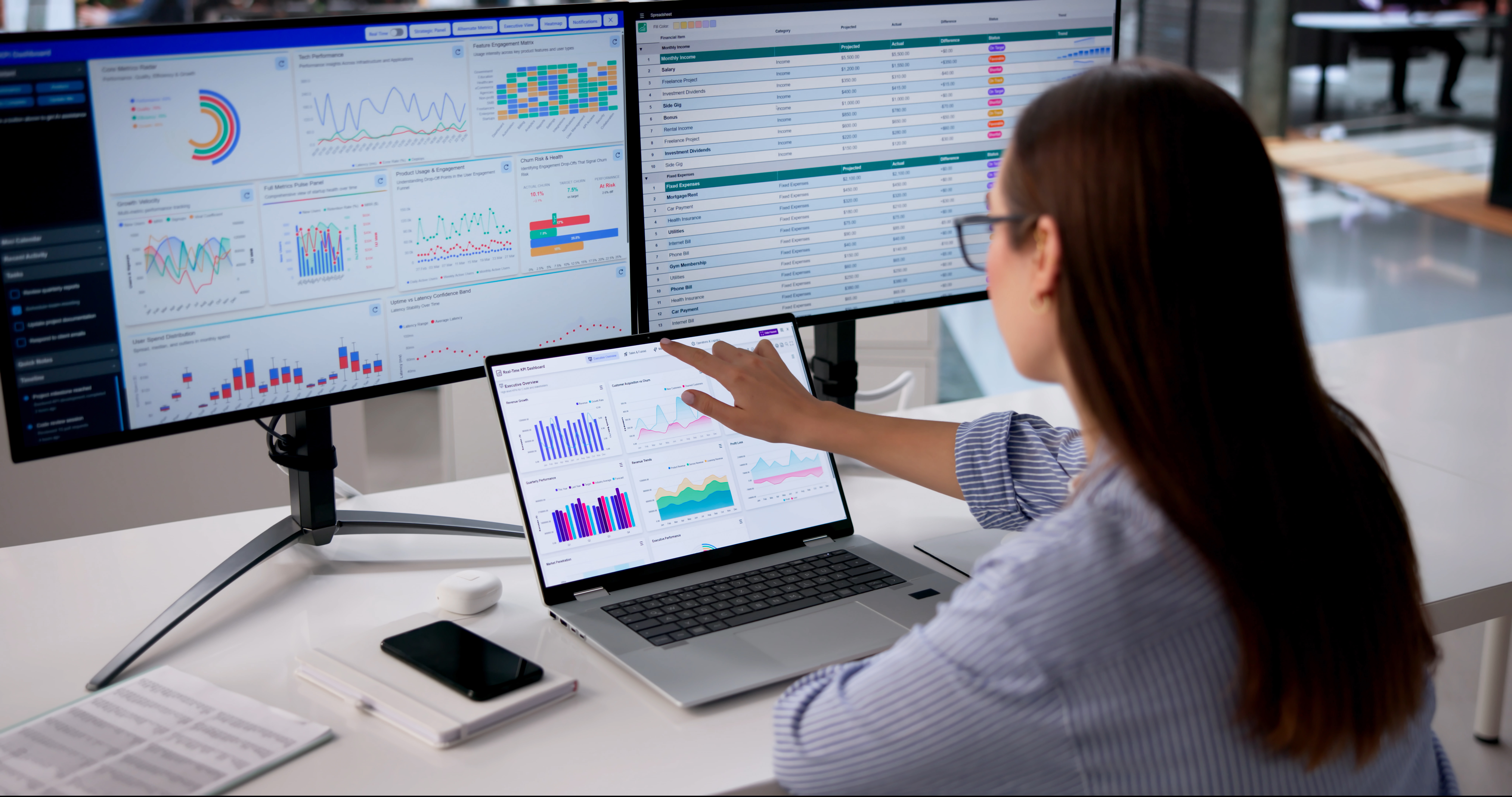 woman at desk using laptop