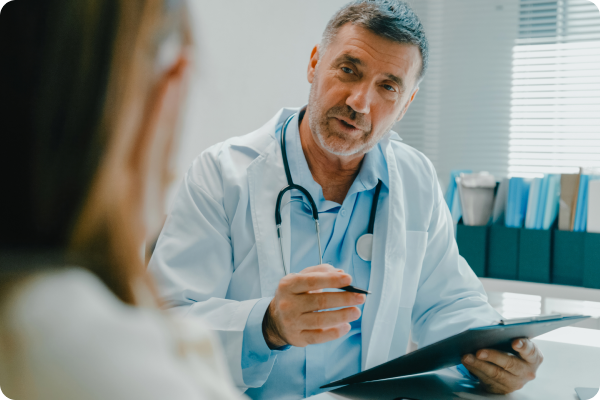 Doctor speaking to patient