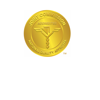 Gold Joint Commission Accredited seal with medical symbol.
