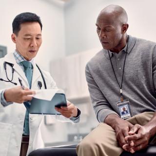 man talking with doctor