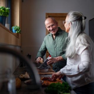 Man and woman cooking. 